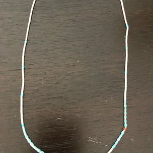 Silver necklace with aqua details